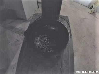 photo of cast iron pot on a wood stove