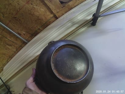 photo of bottom of cast iron pot