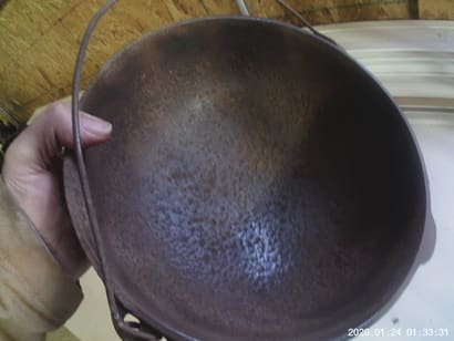 photo of cast iron pot cleaned of rust pitted