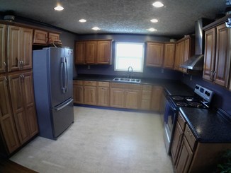 a picture of the kitchen cabinets before undercabinet lights installed